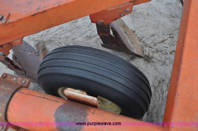 image for item C3391 Massey Fergusen 570 five bottom rollover plow