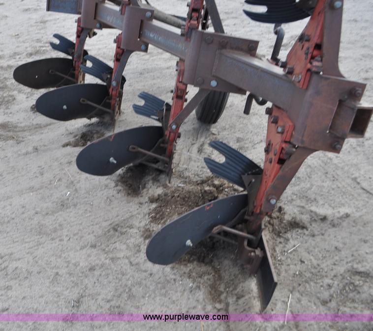 image for item C3392 International 140 four bottom rollover plow