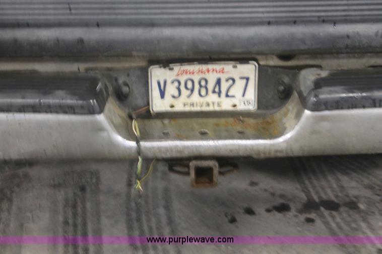 image for item E2562 1999 Dodge Ram 2500 Quad Cab pickup truck