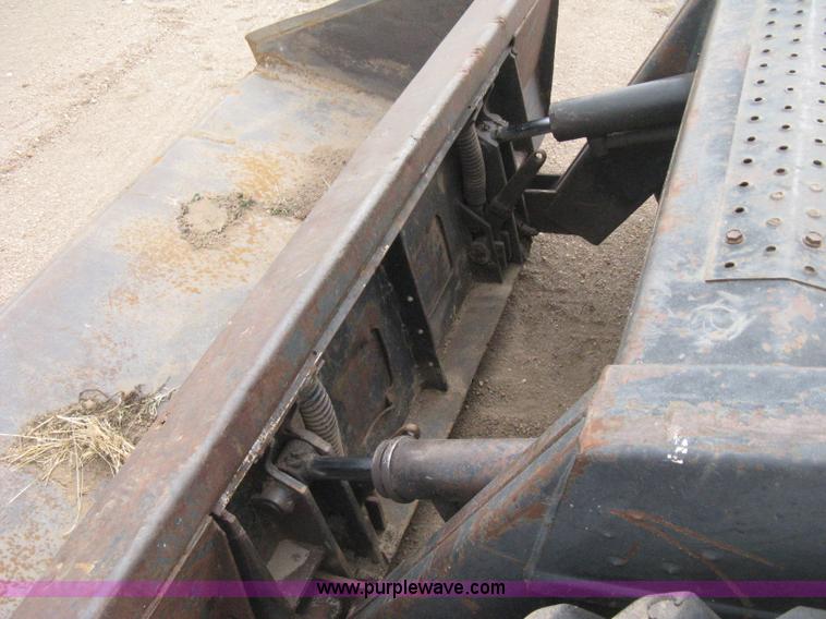 image for item E3024 New Holland L785 skid steer