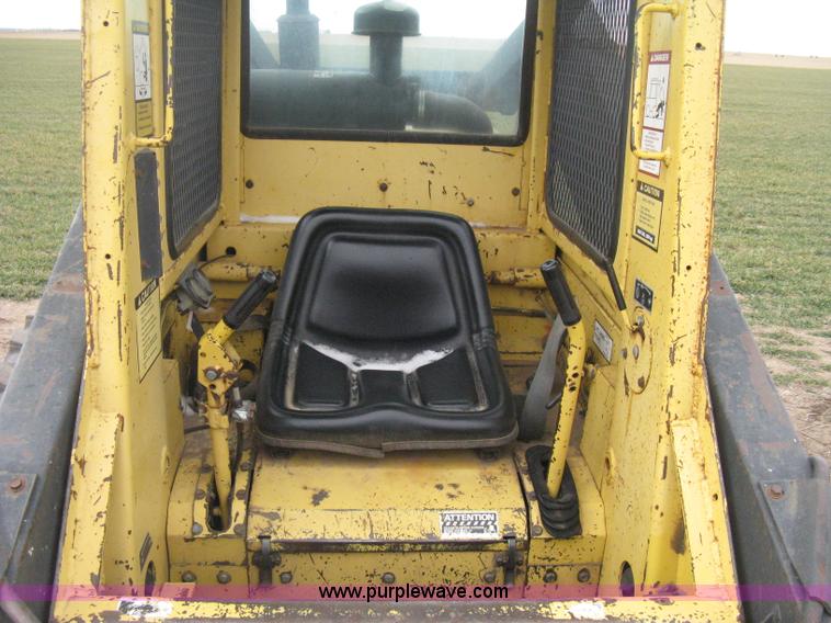 image for item E3024 New Holland L785 skid steer