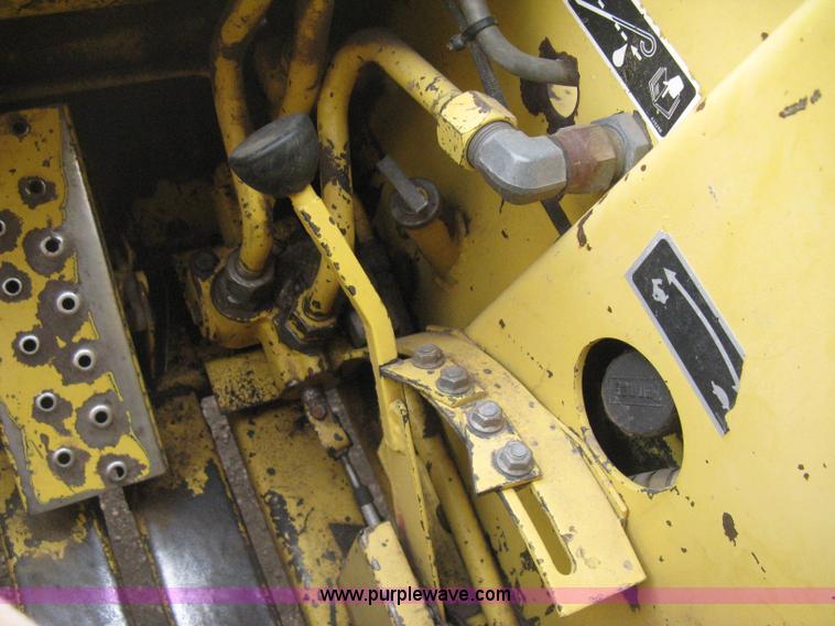 image for item E3024 New Holland L785 skid steer