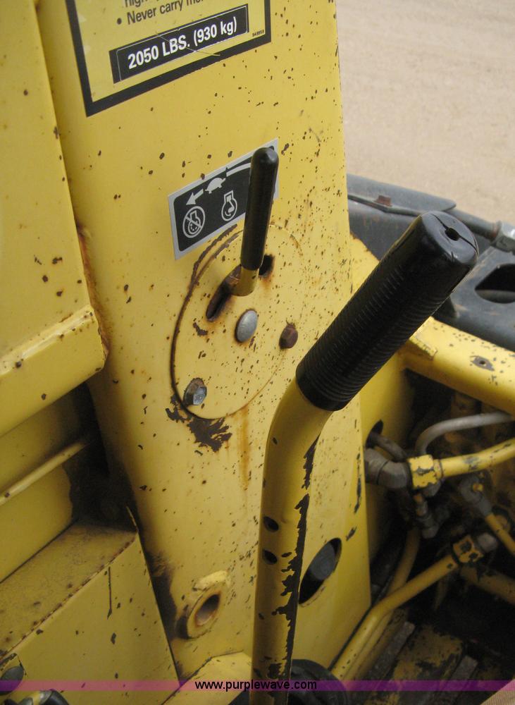 image for item E3024 New Holland L785 skid steer