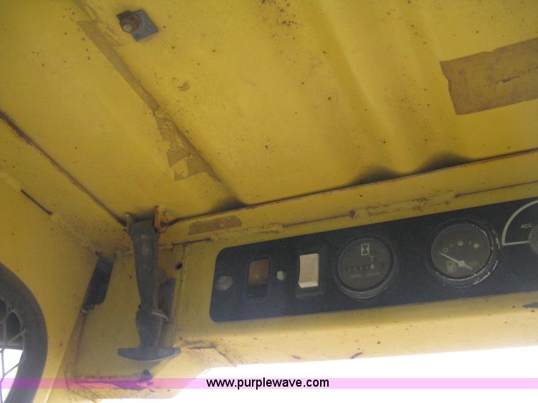 image for item E3024 New Holland L785 skid steer