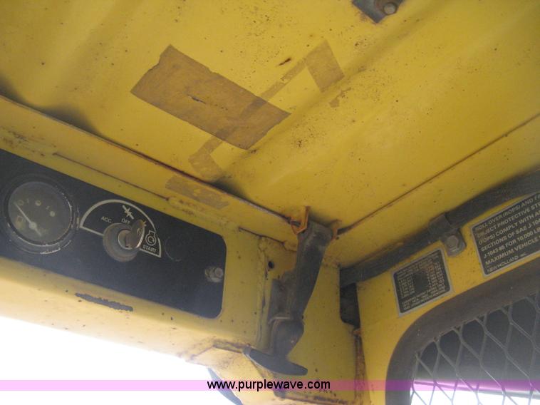 image for item E3024 New Holland L785 skid steer