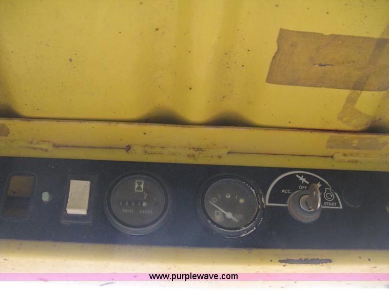 image for item E3024 New Holland L785 skid steer