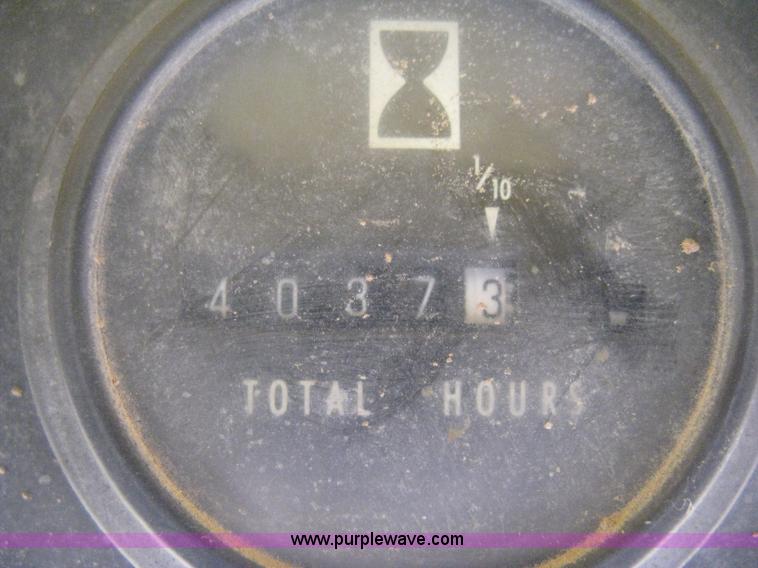 image for item E3024 New Holland L785 skid steer