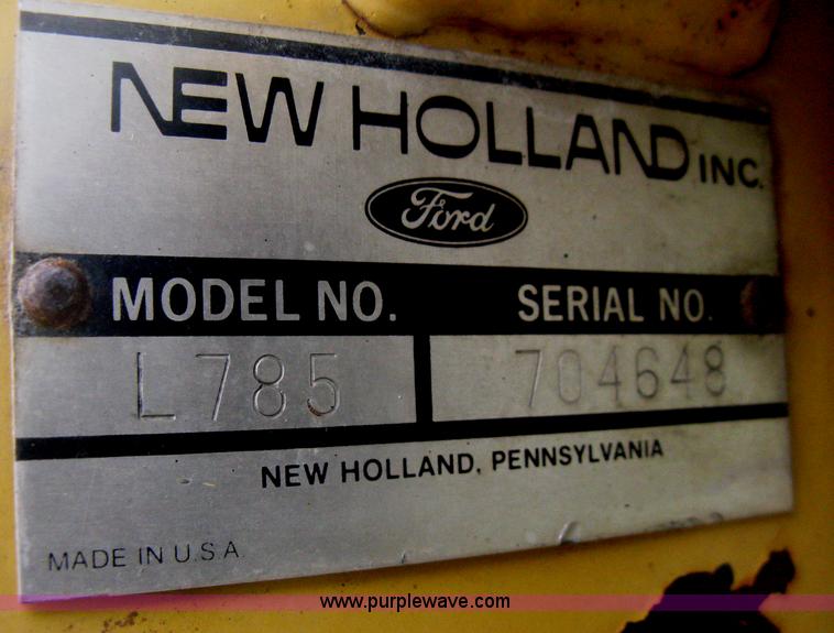 image for item E3024 New Holland L785 skid steer