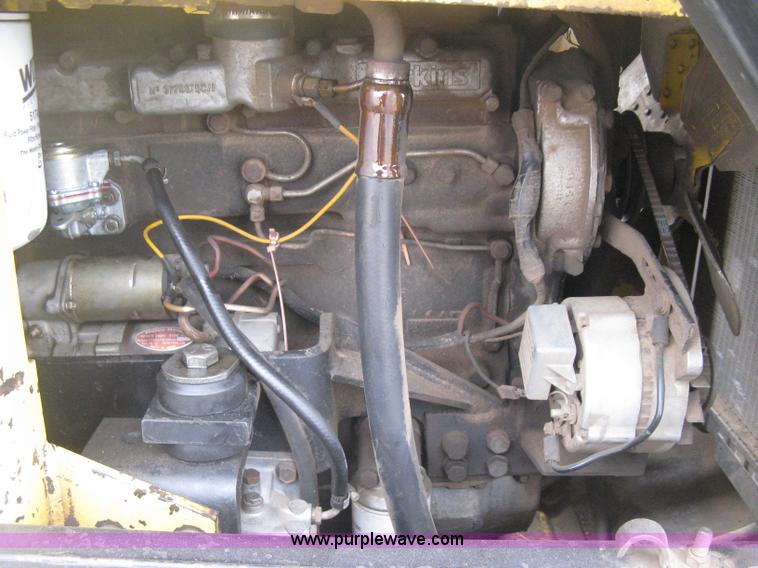 image for item E3024 New Holland L785 skid steer