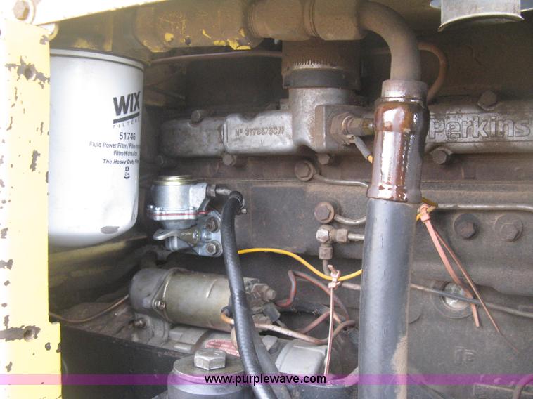 image for item E3024 New Holland L785 skid steer