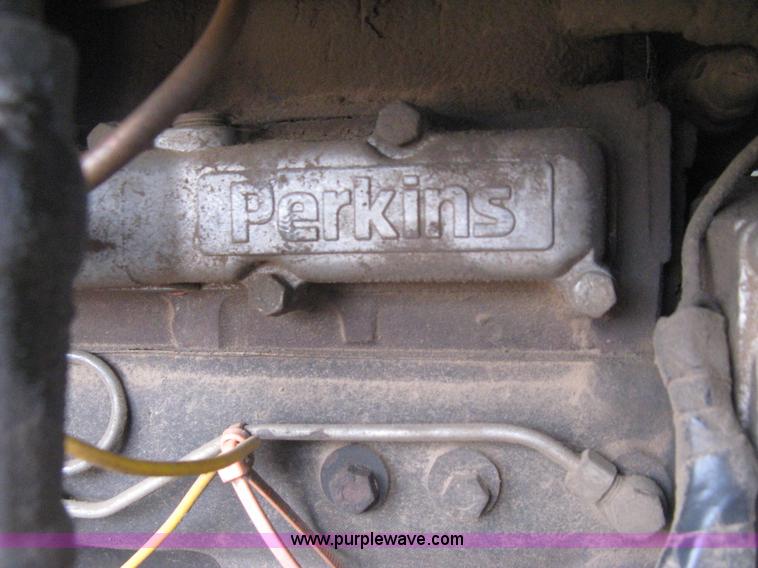 image for item E3024 New Holland L785 skid steer