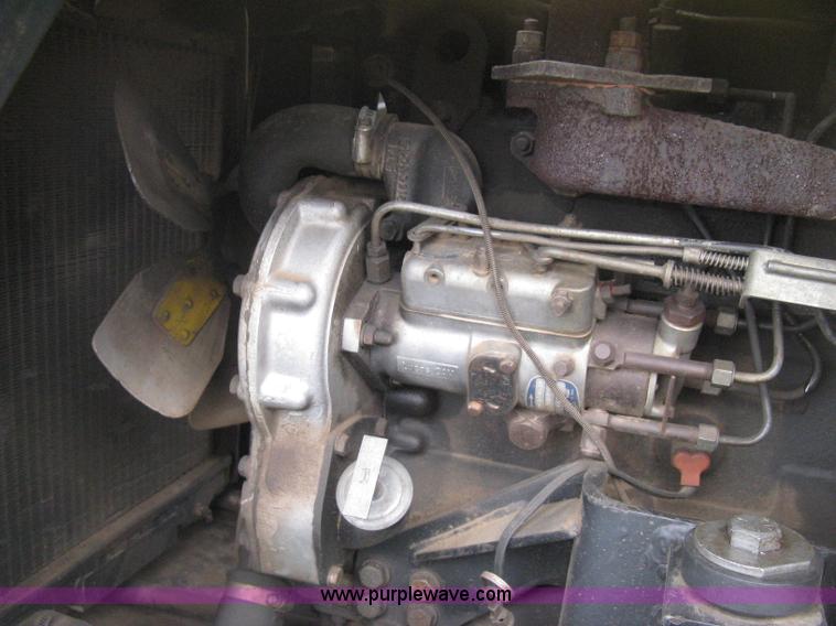 image for item E3024 New Holland L785 skid steer