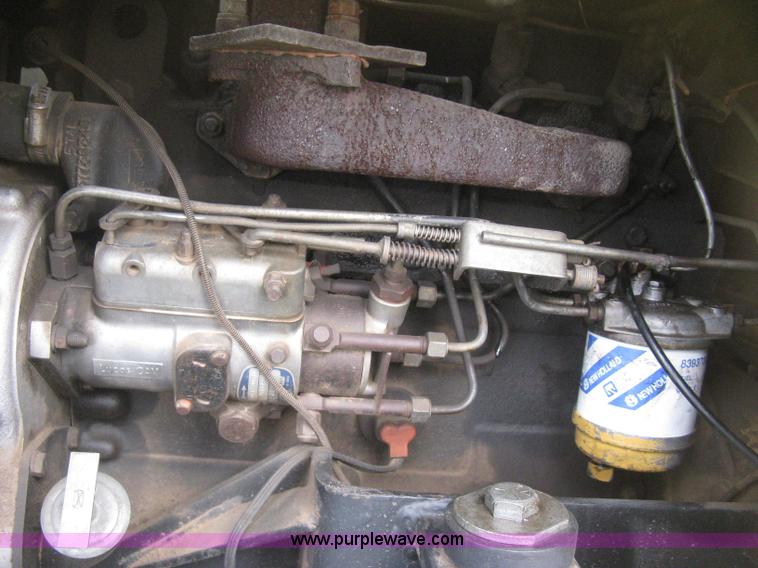 image for item E3024 New Holland L785 skid steer