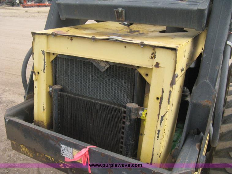 image for item E3024 New Holland L785 skid steer