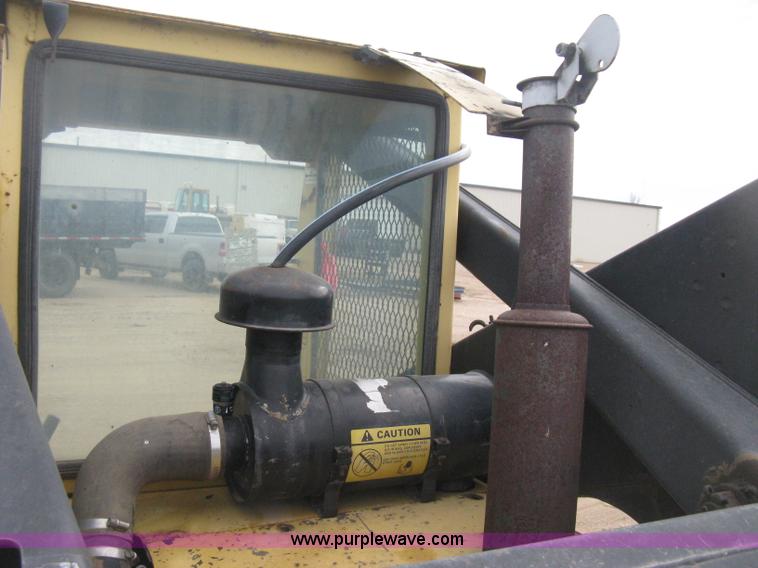 image for item E3024 New Holland L785 skid steer