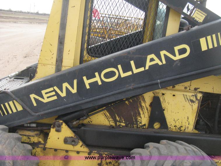 image for item E3024 New Holland L785 skid steer