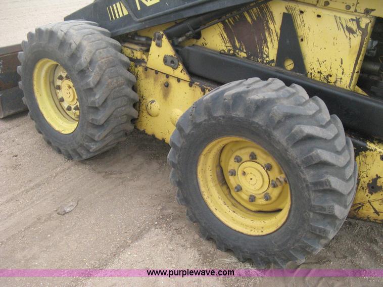 image for item E3024 New Holland L785 skid steer