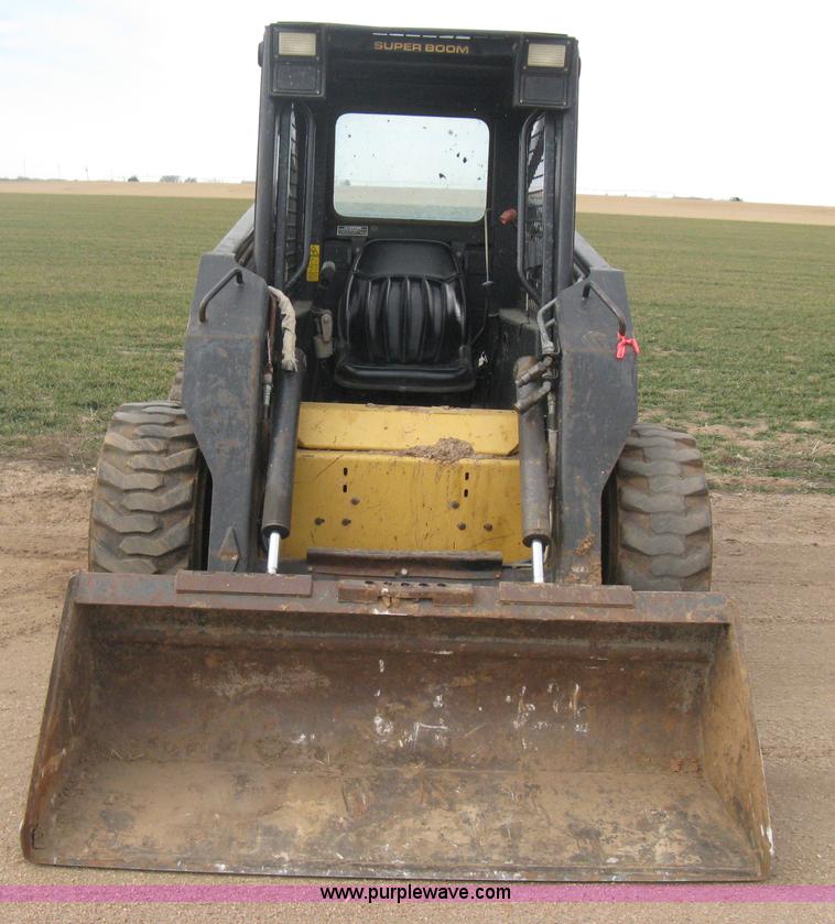 image for item E3025 1997 New Holland LX885 Turbo skid steer