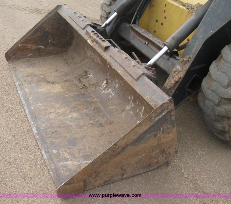 image for item E3025 1997 New Holland LX885 Turbo skid steer