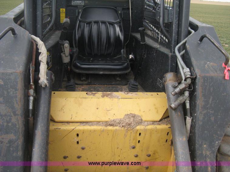 image for item E3025 1997 New Holland LX885 Turbo skid steer