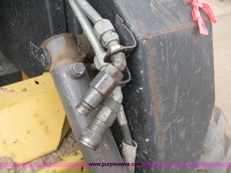 image for item E3025 1997 New Holland LX885 Turbo skid steer