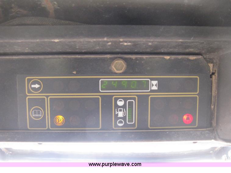 image for item E3025 1997 New Holland LX885 Turbo skid steer