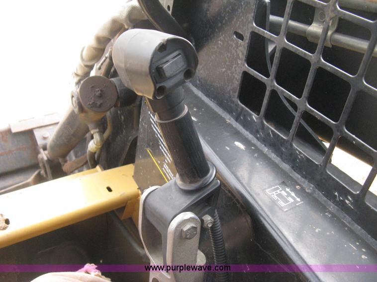 image for item E3025 1997 New Holland LX885 Turbo skid steer