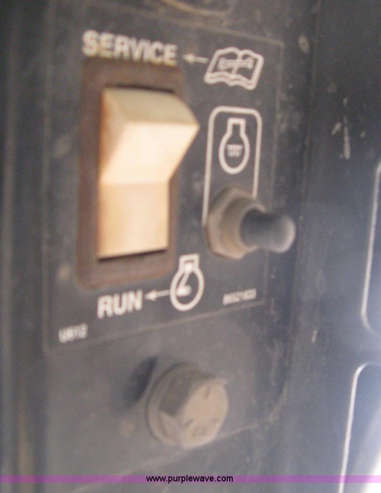 image for item E3025 1997 New Holland LX885 Turbo skid steer