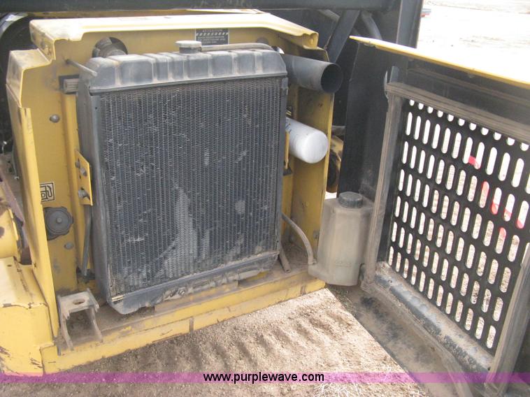 image for item E3025 1997 New Holland LX885 Turbo skid steer