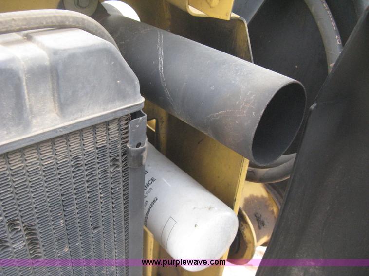 image for item E3025 1997 New Holland LX885 Turbo skid steer