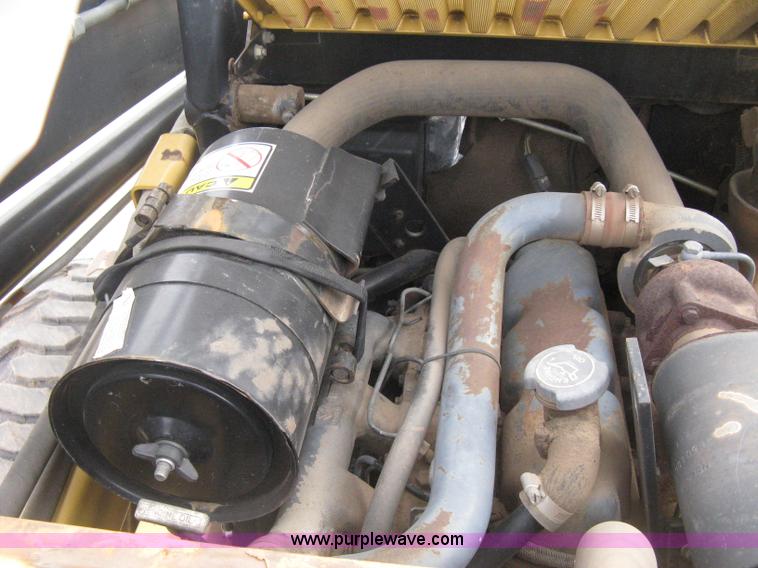 image for item E3025 1997 New Holland LX885 Turbo skid steer