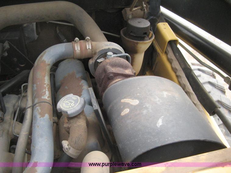 image for item E3025 1997 New Holland LX885 Turbo skid steer