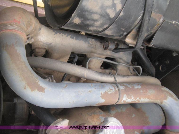 image for item E3025 1997 New Holland LX885 Turbo skid steer