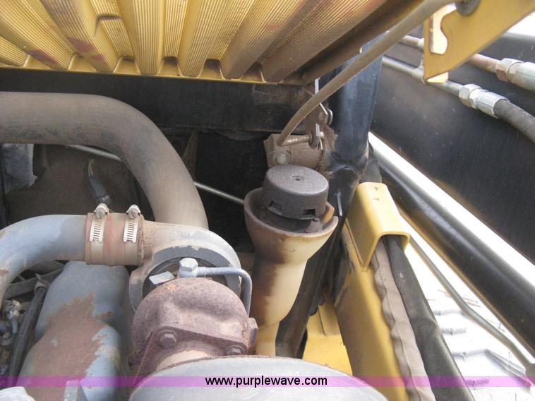 image for item E3025 1997 New Holland LX885 Turbo skid steer