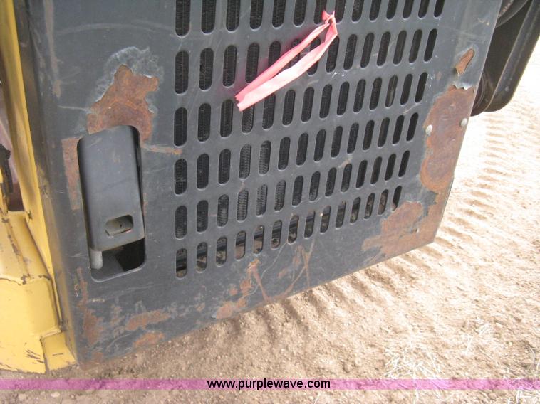 image for item E3025 1997 New Holland LX885 Turbo skid steer