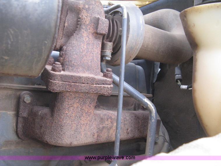 image for item E3025 1997 New Holland LX885 Turbo skid steer