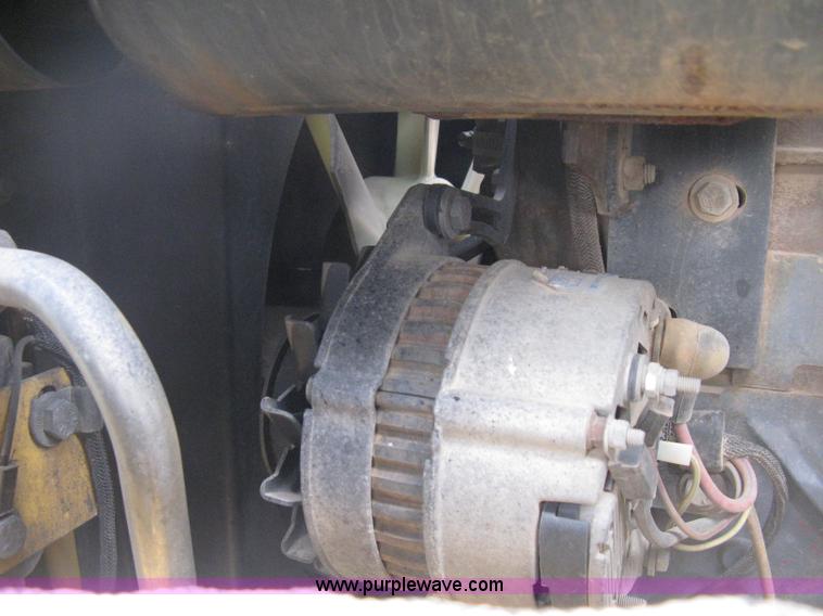 image for item E3025 1997 New Holland LX885 Turbo skid steer