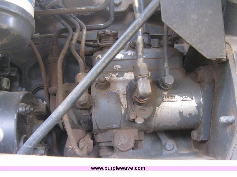 image for item E3025 1997 New Holland LX885 Turbo skid steer