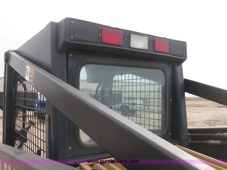 image for item E3025 1997 New Holland LX885 Turbo skid steer