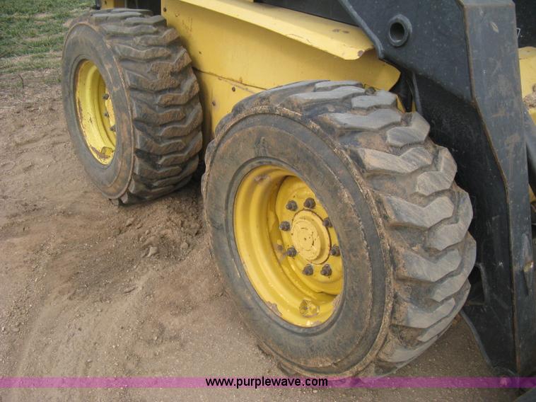 image for item E3025 1997 New Holland LX885 Turbo skid steer