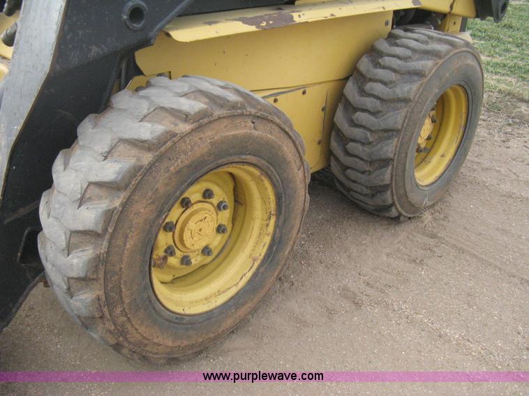 image for item E3025 1997 New Holland LX885 Turbo skid steer