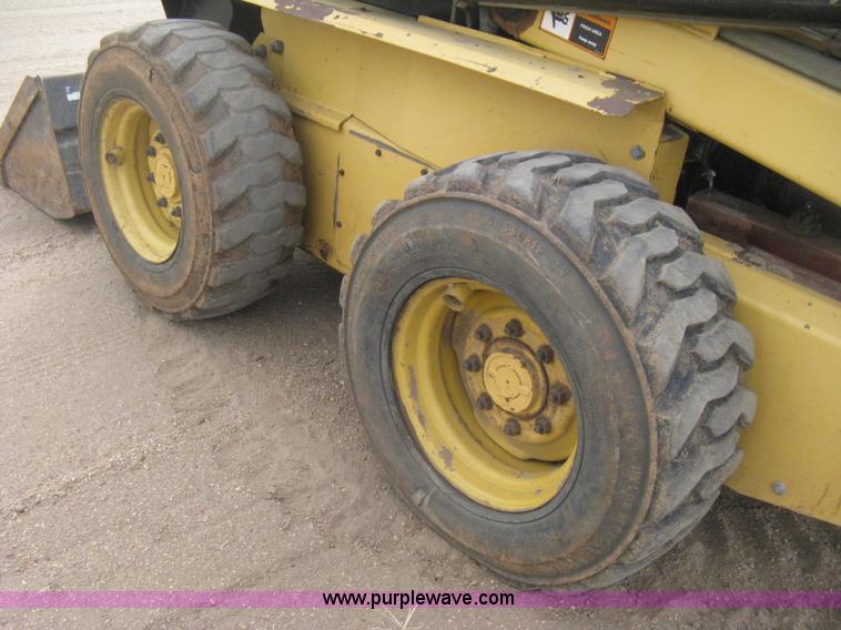 image for item E3025 1997 New Holland LX885 Turbo skid steer