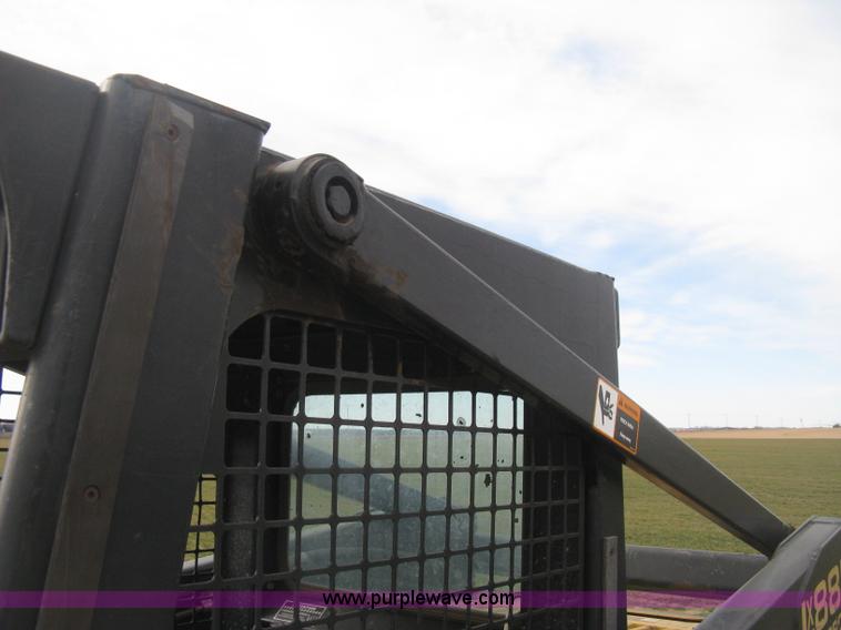 image for item E3025 1997 New Holland LX885 Turbo skid steer