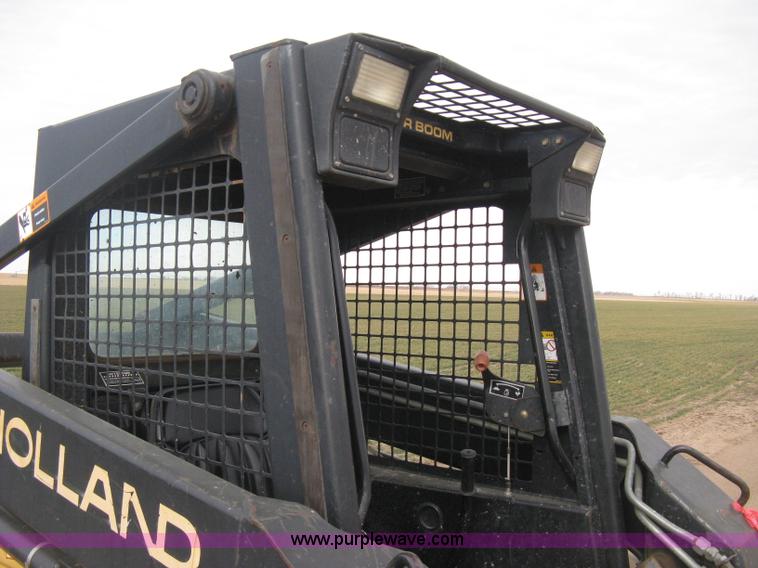 image for item E3025 1997 New Holland LX885 Turbo skid steer