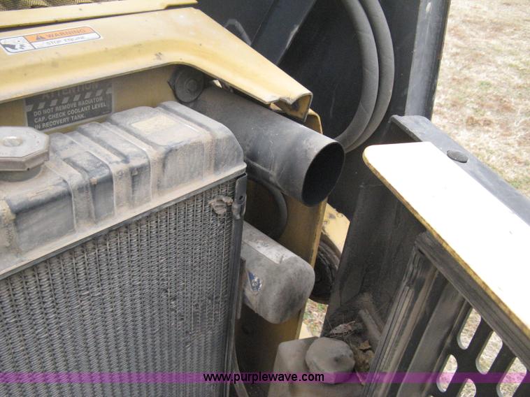 image for item E3026 1994 New Holland LX665 Turbo skid steer