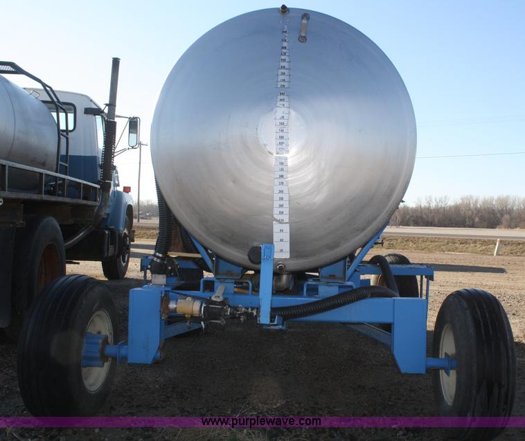 image for item F2997 1,000 gallon stainless steel nurse tank on running gear