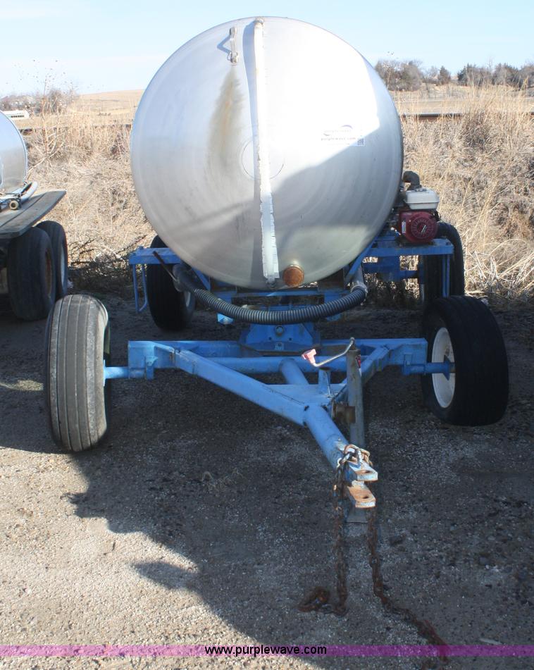 image for item F2997 1,000 gallon stainless steel nurse tank on running gear