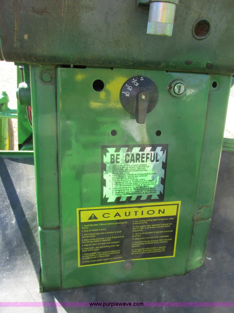 image for item F4264 1965 John Deere 3020 tractor