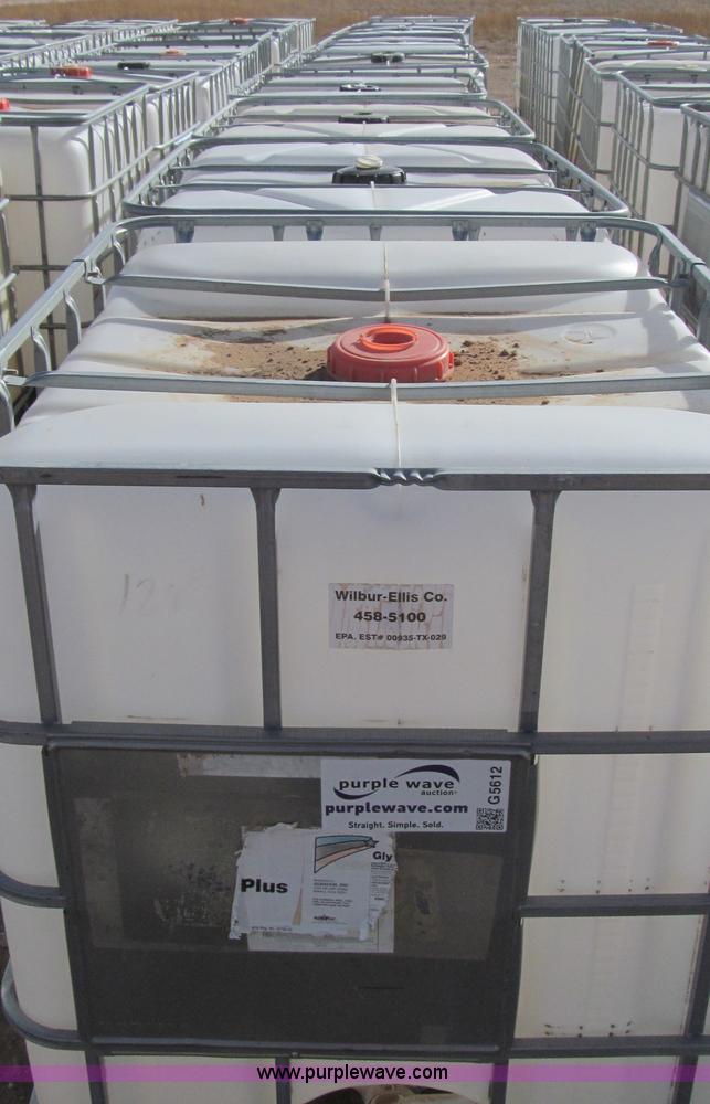 (10) poly storage tanks with aluminum cages in Dalhart, TX Item G5612