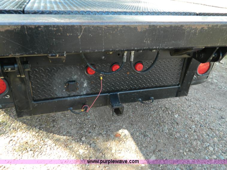 image for item G7537 2004 Ford F350 XL Super Duty flatbed pickup truck